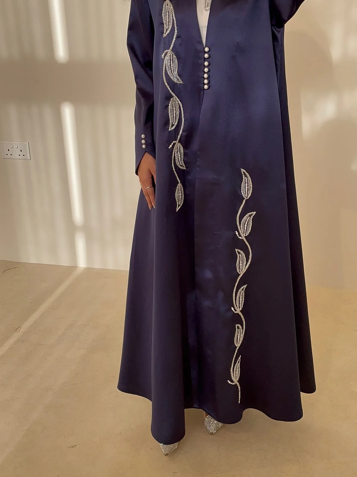 A-cut navy taffeta abaya with sequins and pearls